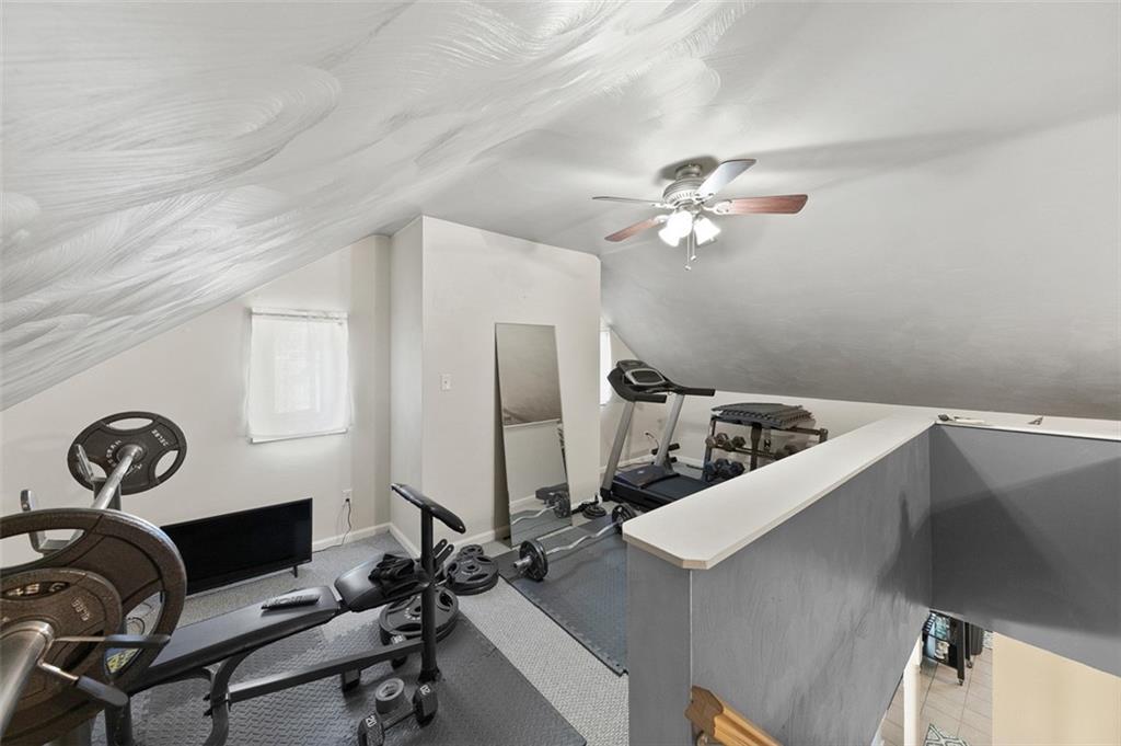 199 Water Street Dickerson Run, PA 15430 - Photo 22 of 22 a view of a workspace with furniture and a window