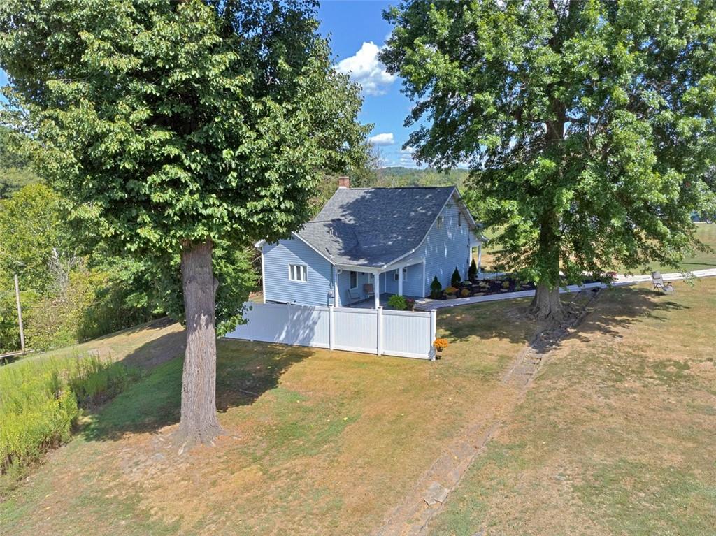199 Water Street Dickerson Run, PA 15430 - Photo 5 of 22 a house view with a outdoor space