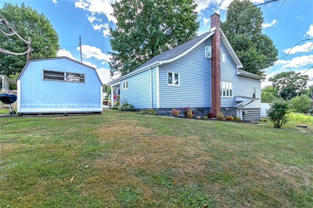 199 Water Street Dickerson Run, PA 15430 - Photo 8 of 22 a view of a house with a yard