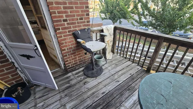 a front view of residential houses with stairs