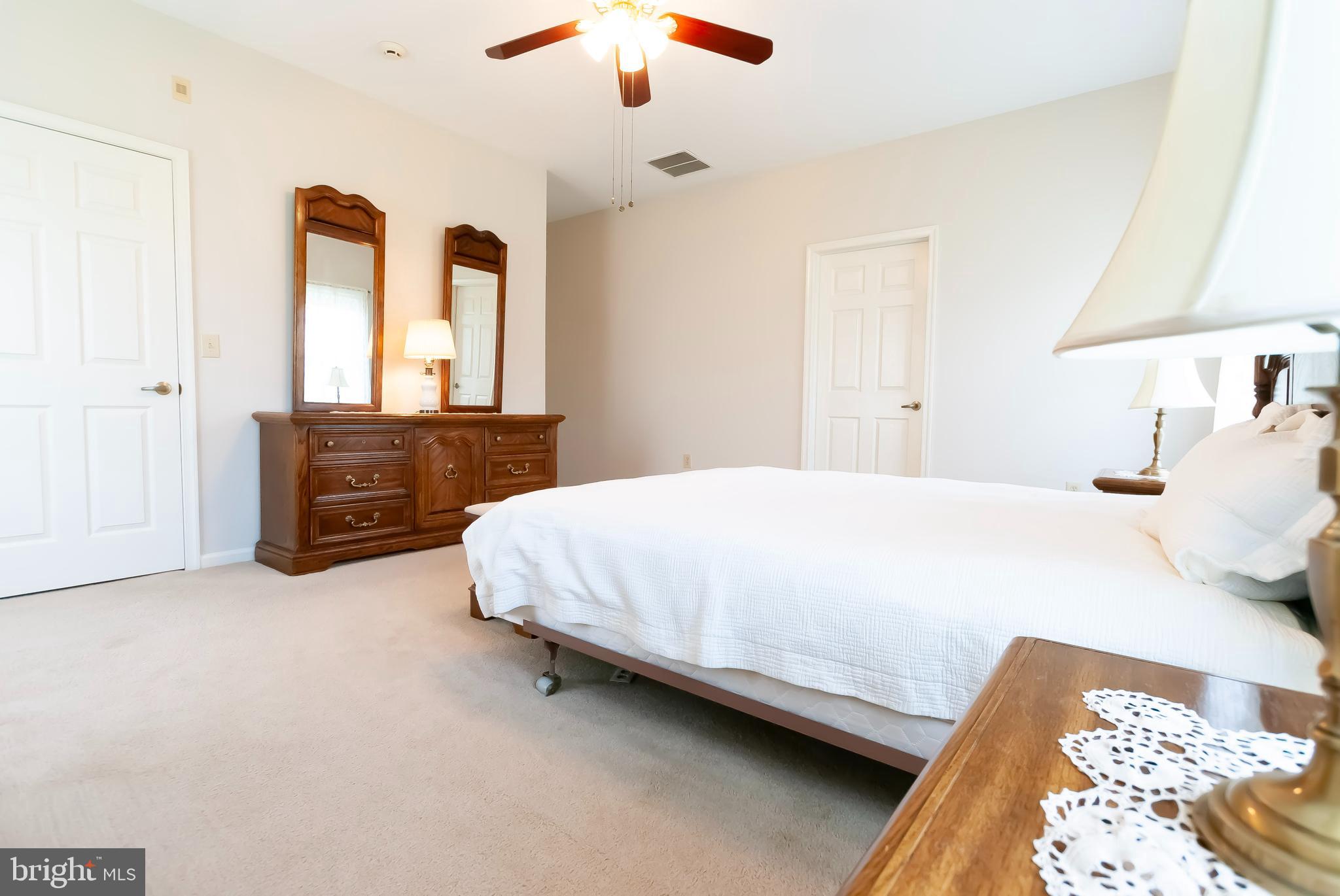 89 Lantern Lane Columbus, NJ 08022 - Photo 23 of 55 a bedroom with a bed and a dresser