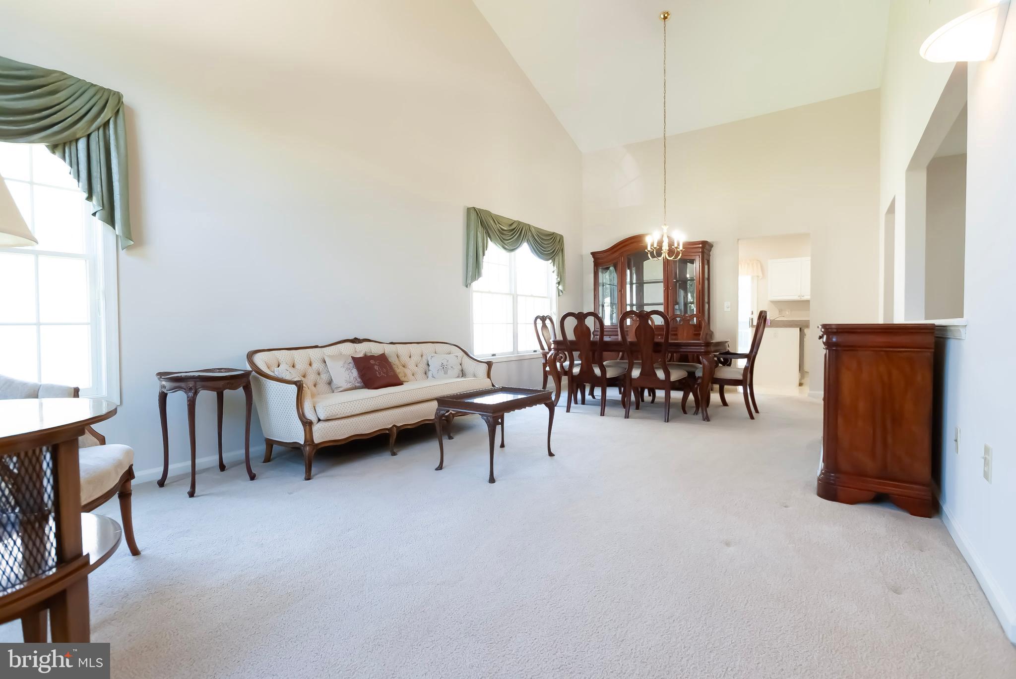 89 Lantern Lane Columbus, NJ 08022 - Photo 6 of 55 a living room with furniture and a chandelier