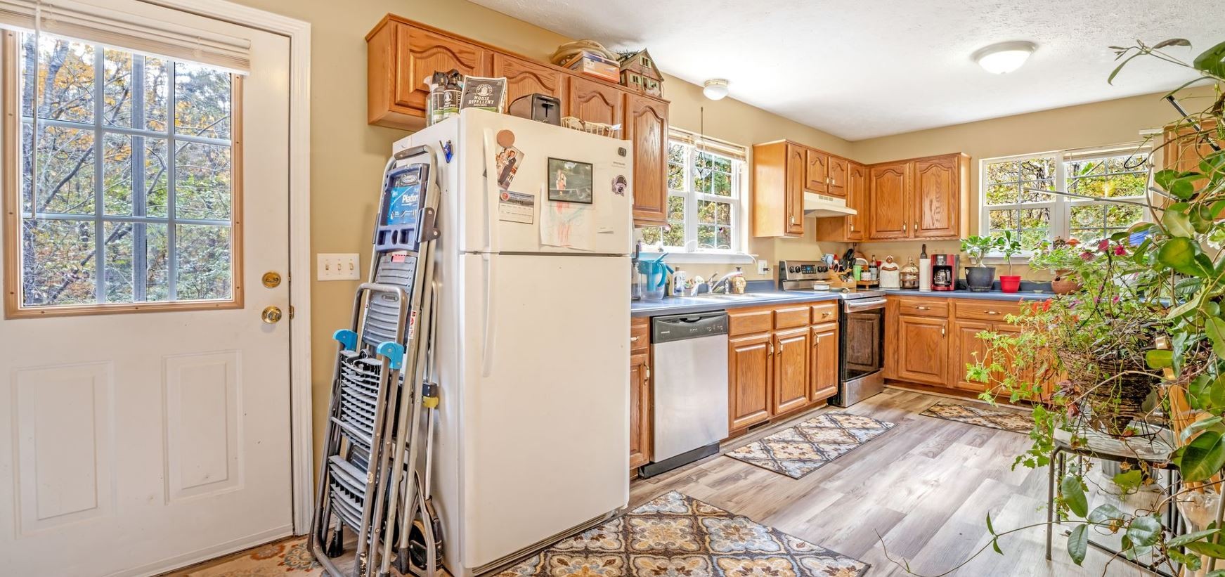 10092 Sneed Road Lyles, TN 37098 - Photo 20 of 31 a kitchen with a sink cabinets and window