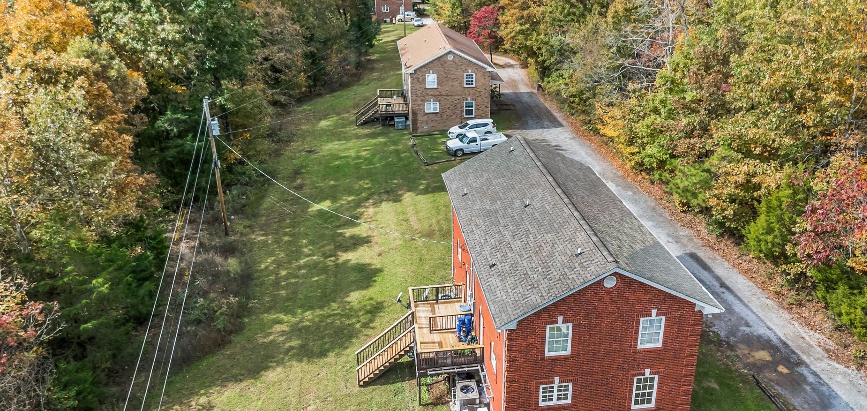10092 Sneed Road Lyles, TN 37098 - Photo 2 of 31 a aerial view of a house with a yard