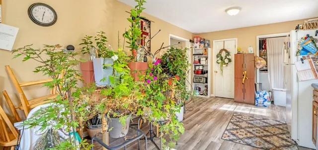 a view of entryway with wooden floor