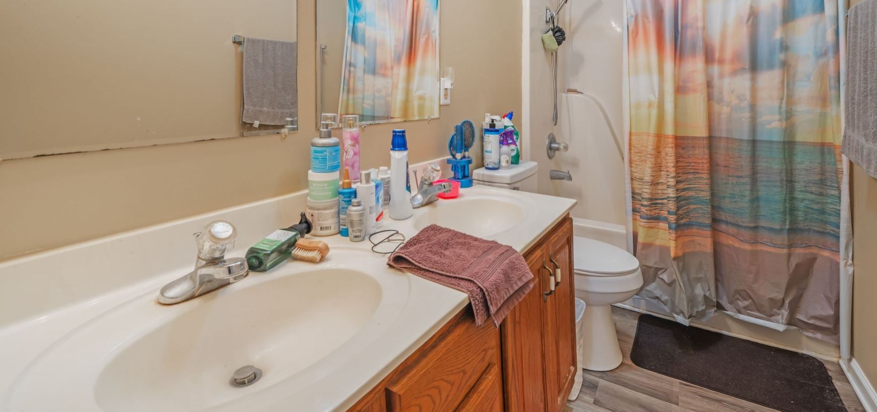 10092 Sneed Road Lyles, TN 37098 - Photo 31 of 31 a bathroom with a granite countertop sink and a mirror
