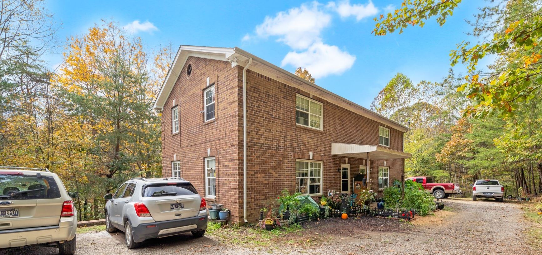 10092 Sneed Road Lyles, TN 37098 - Photo 4 of 31 a car parked in front of a building