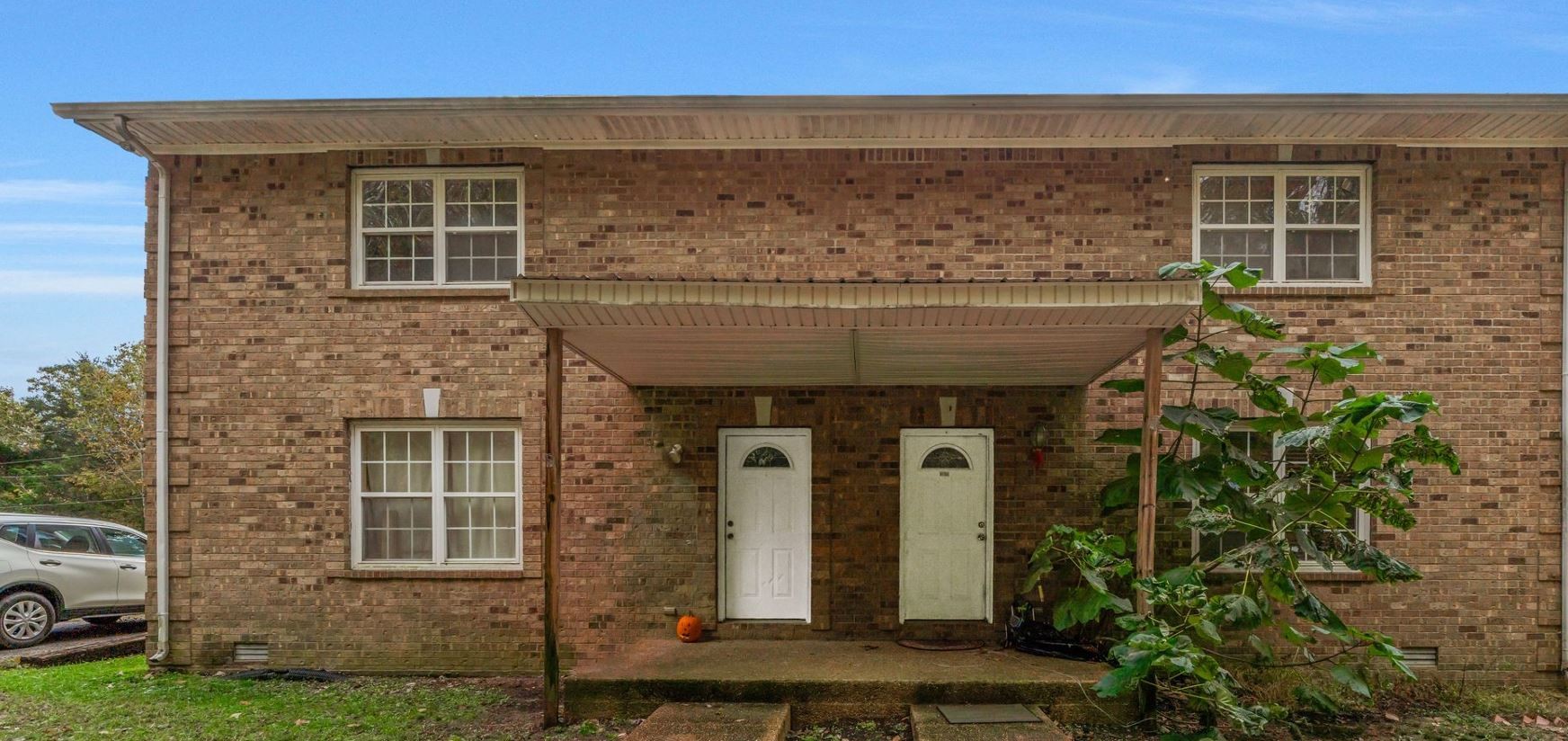 10092 Sneed Road Lyles, TN 37098 - Photo 7 of 31 a front view of a house with a yard