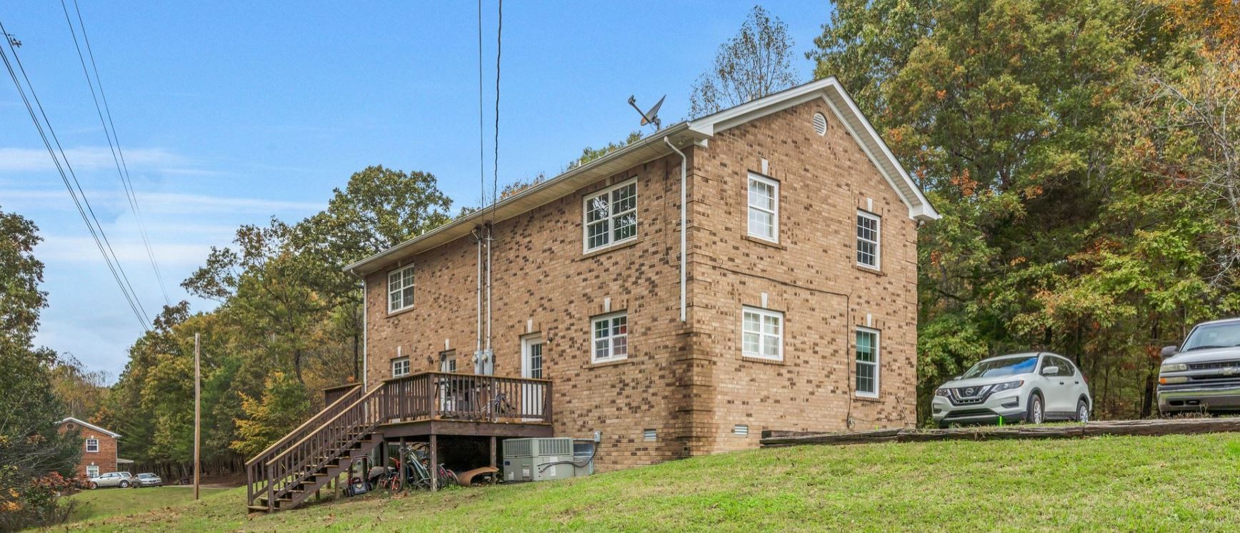 10092 Sneed Road Lyles, TN 37098 - Photo 10 of 31 a view of house with backyard