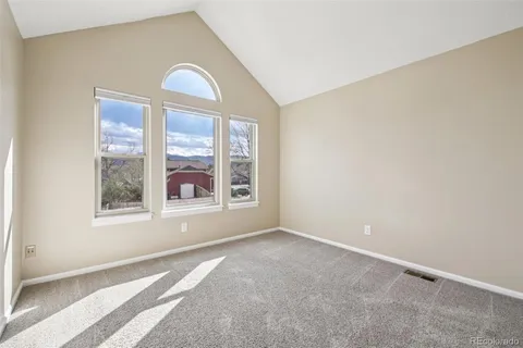 a view of an empty room and closet