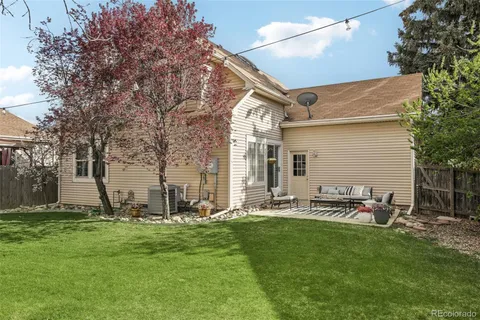 a view of a backyard with a garden