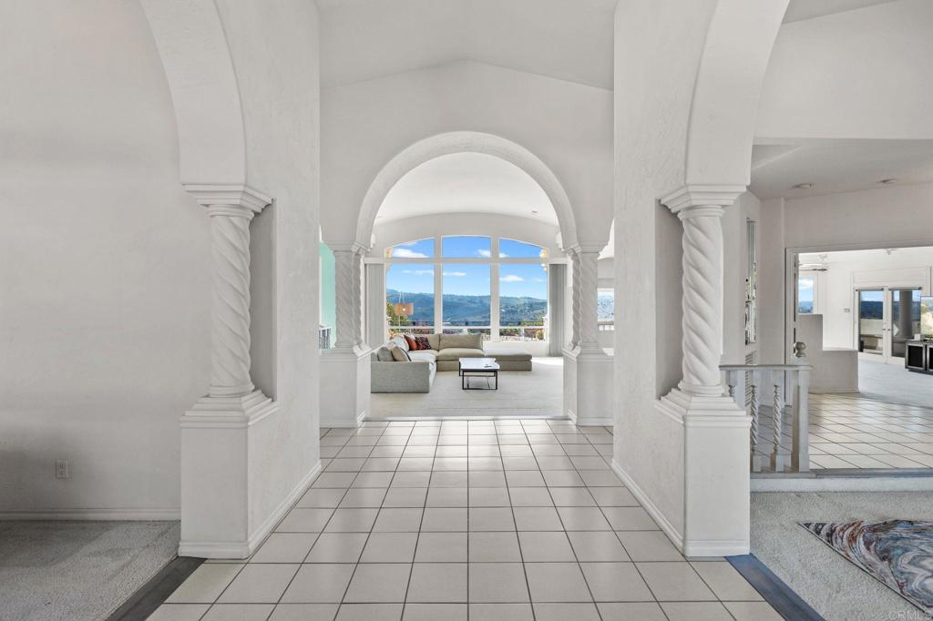 1402 Vista De Lomas Bonsall, CA 92003 - Photo 11 of 56 a view of entryway with livingroom and furniture
