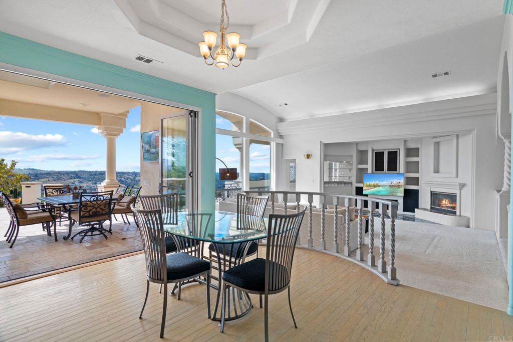 1402 Vista De Lomas Bonsall, CA 92003 - Photo 18 of 56 a view of a dining room with furniture window and outside view