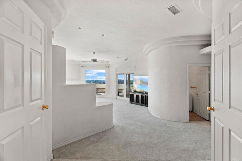 1402 Vista De Lomas Bonsall, CA 92003 - Photo 19 of 56 a view of a kitchen with wooden floor and windows