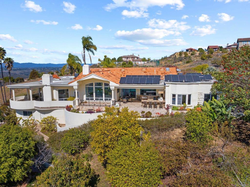 1402 Vista De Lomas Bonsall, CA 92003 - Photo 2 of 56 a front view of a house with a yard