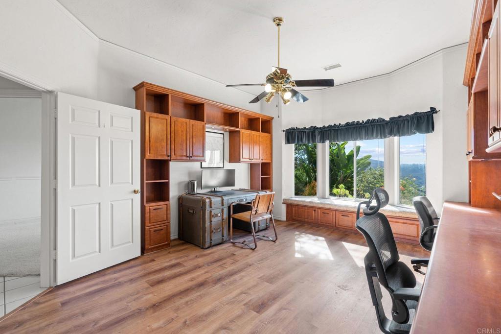 1402 Vista De Lomas Bonsall, CA 92003 - Photo 40 of 56 a view of a livingroom with furniture window and wooden floor