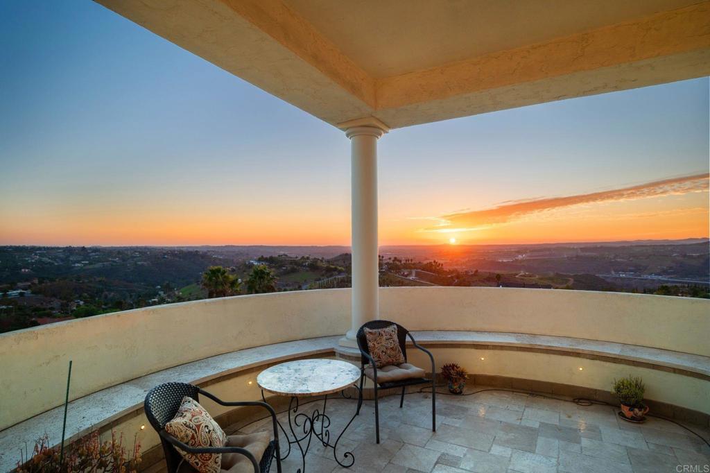 1402 Vista De Lomas Bonsall, CA 92003 - Photo 48 of 56 a view of a patio with a table and chairs