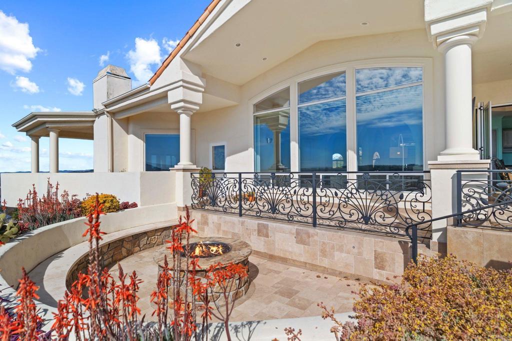 1402 Vista De Lomas Bonsall, CA 92003 - Photo 50 of 56 a bedroom with furniture and a large window