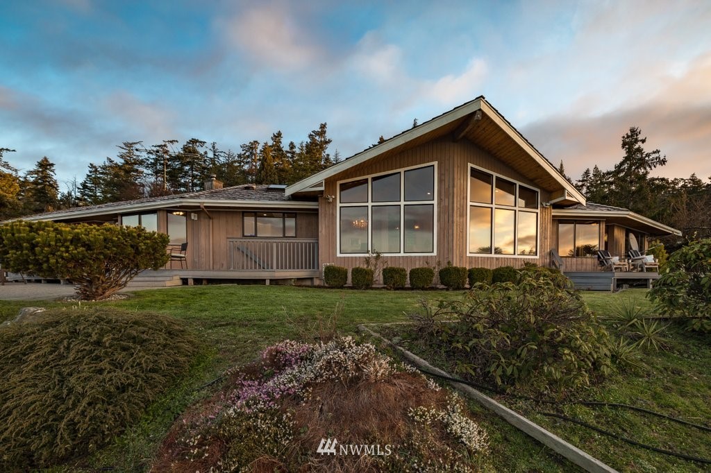 1860 East Hunskor Road Oak Harbor, WA 98277 - Photo 2 of 40 a view of a house with backyard and garden