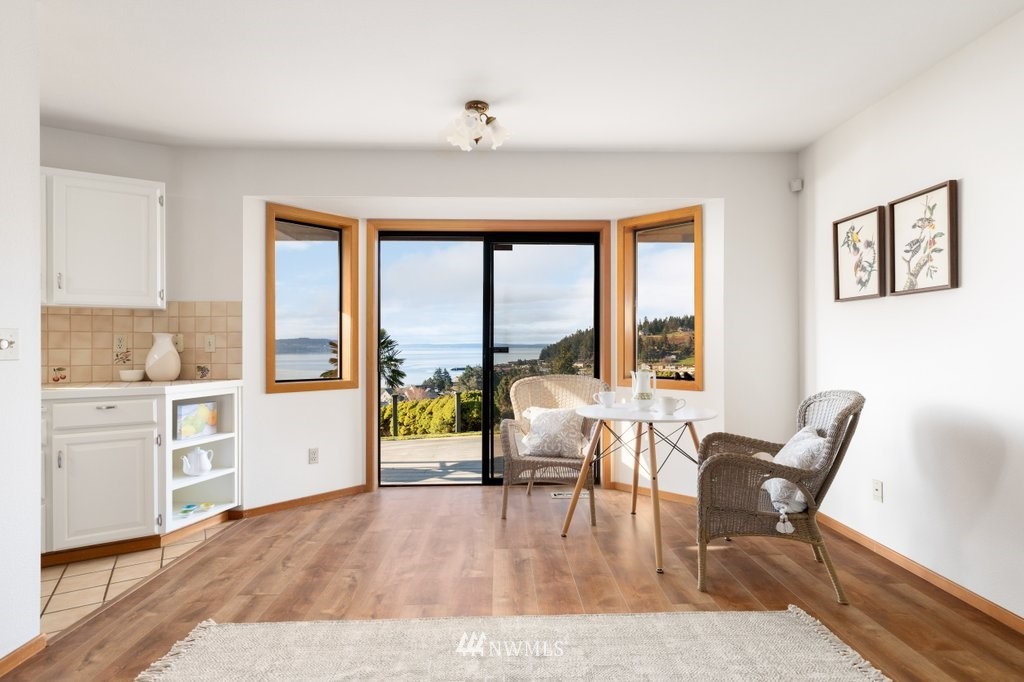 1860 East Hunskor Road Oak Harbor, WA 98277 - Photo 16 of 40 a living room with furniture and a large window