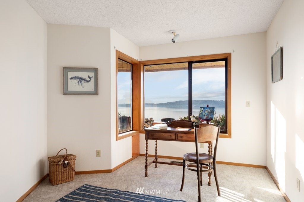 1860 East Hunskor Road Oak Harbor, WA 98277 - Photo 25 of 40 a living room with furniture and a window