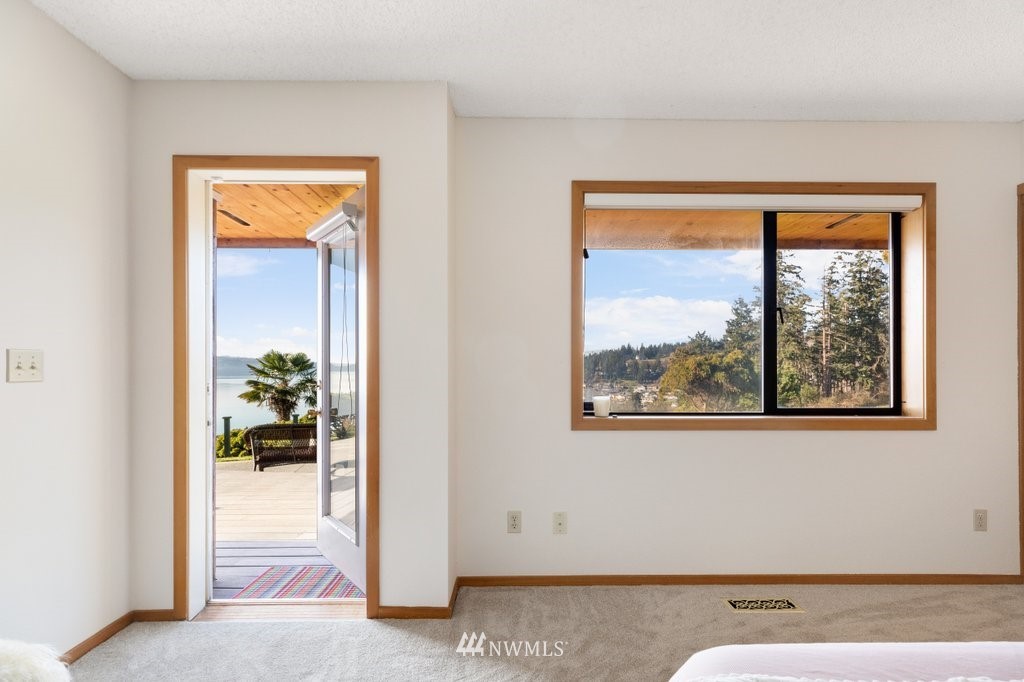 1860 East Hunskor Road Oak Harbor, WA 98277 - Photo 31 of 40 a view of a room with a large window