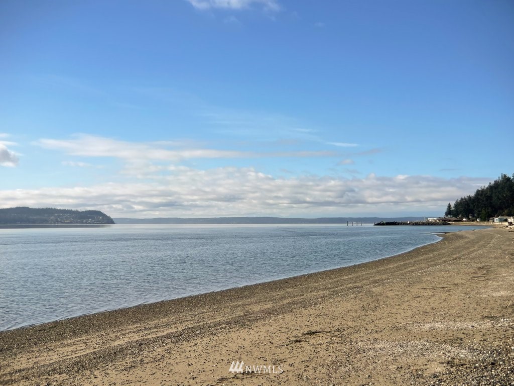 1860 East Hunskor Road Oak Harbor, WA 98277 - Photo 36 of 40 a view of an ocean yard and mountain