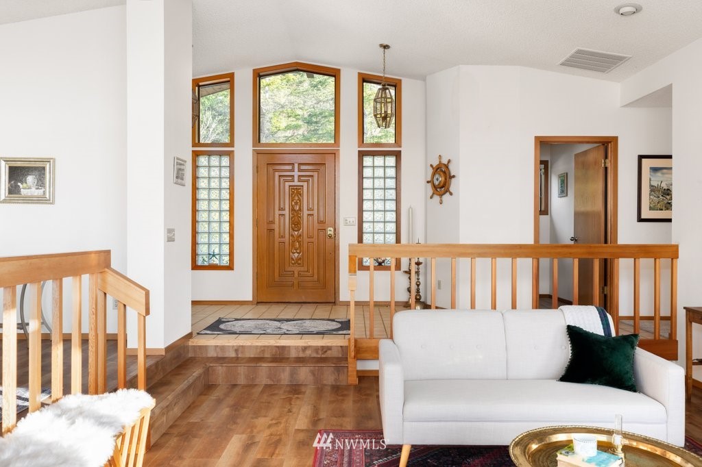 1860 East Hunskor Road Oak Harbor, WA 98277 - Photo 10 of 40 a living room with furniture and a window