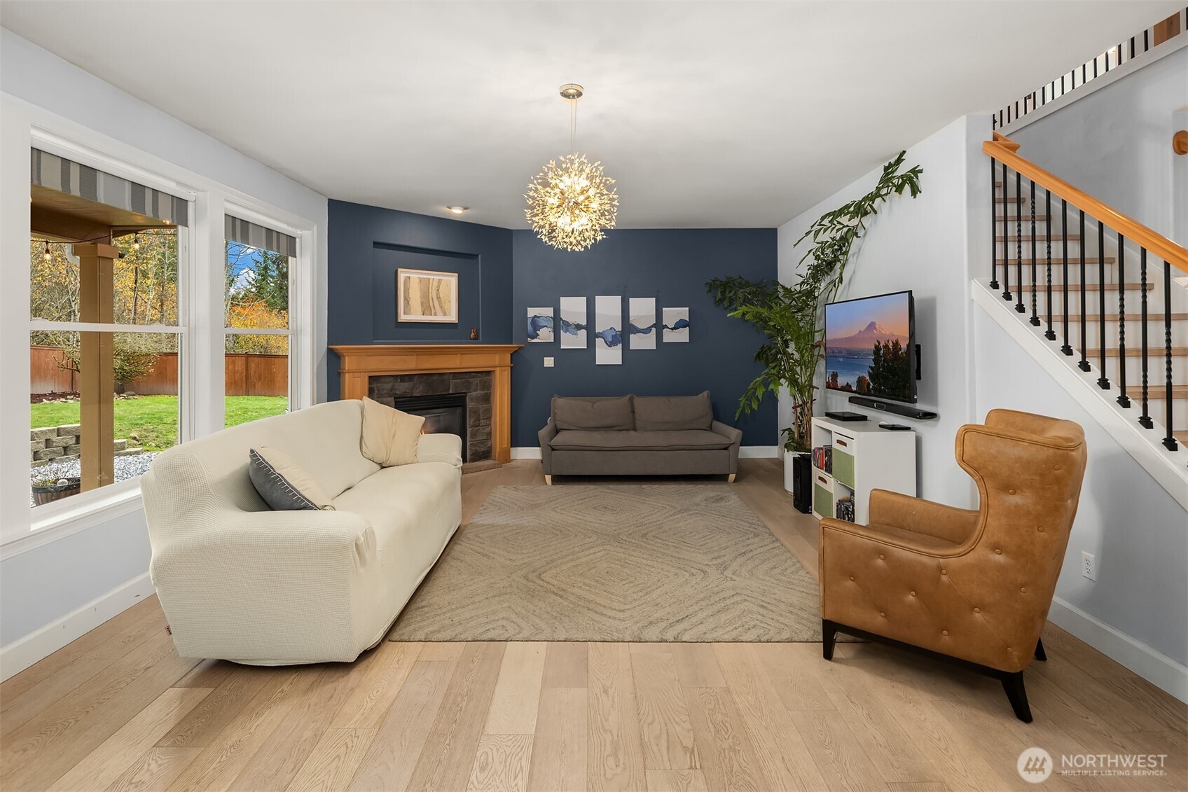 12902 194th Ave Court East Bonney Lake, WA 98391 - Photo 16 of 40 a living room with furniture and a fireplace