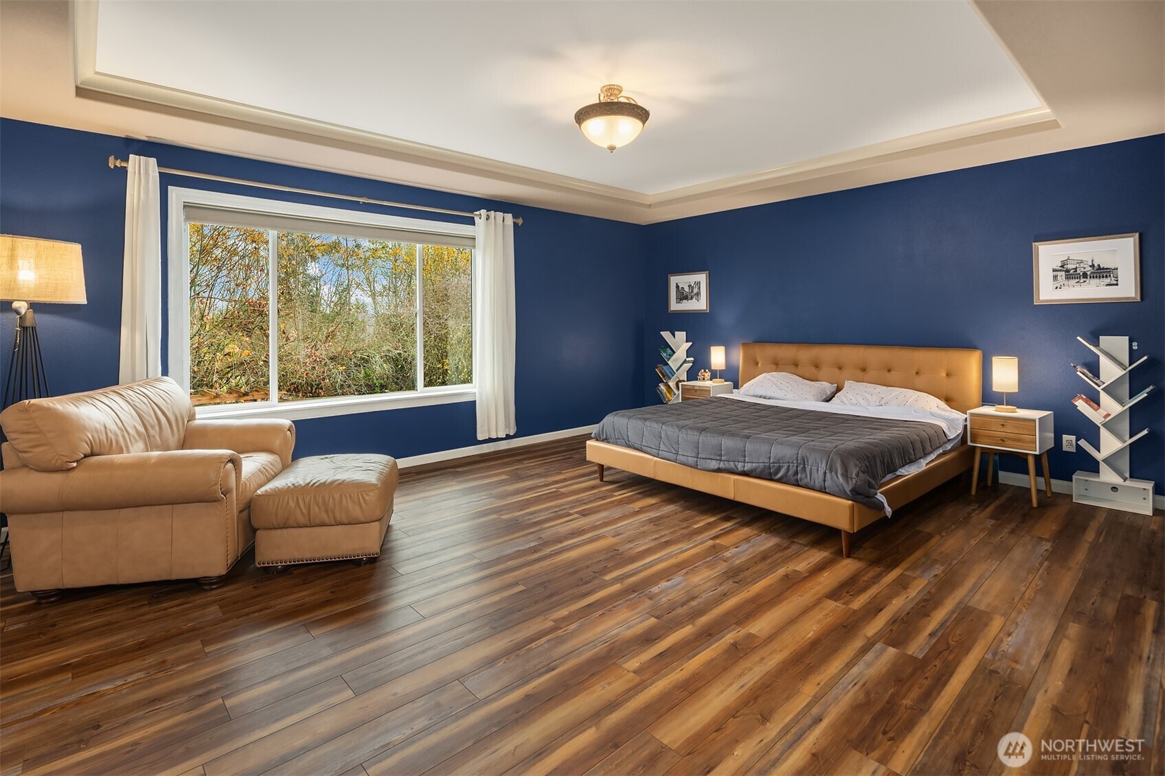 12902 194th Ave Court East Bonney Lake, WA 98391 - Photo 18 of 40 a bedroom with a bed and a couch with window
