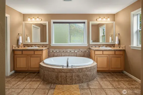 a view of a bathtub in a bathroom