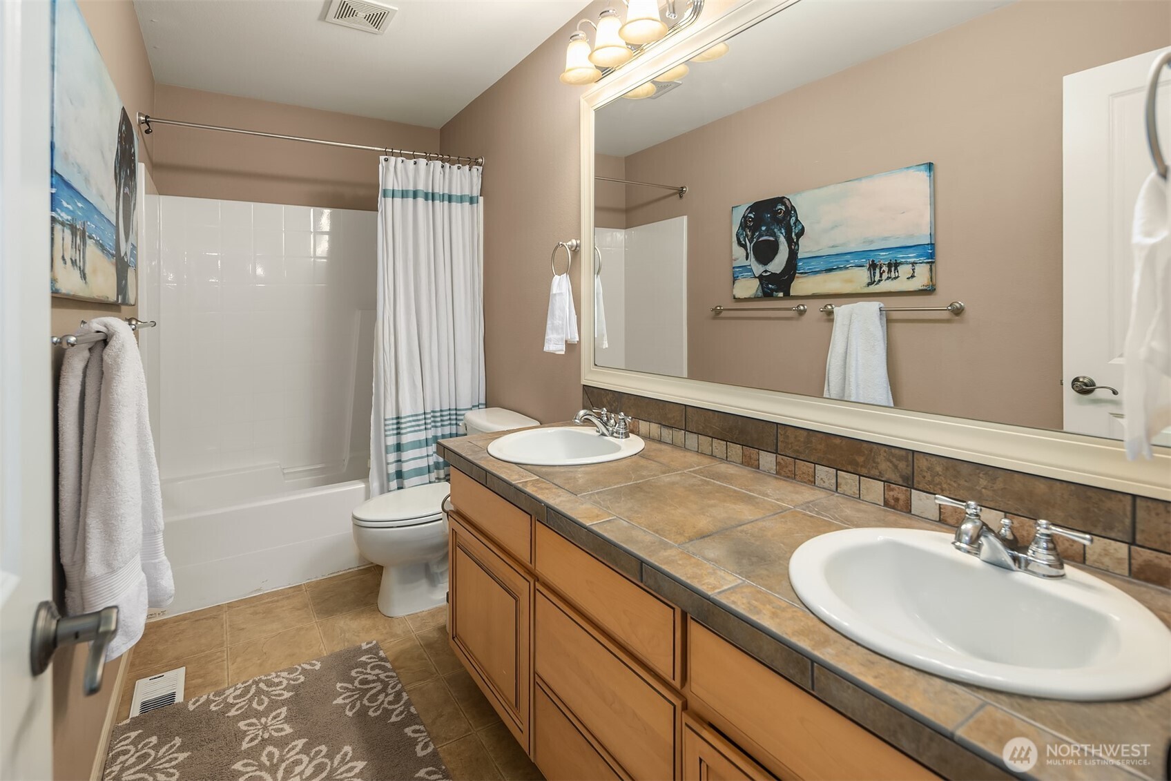 12902 194th Ave Court East Bonney Lake, WA 98391 - Photo 25 of 40 a bathroom with a sink double vanity and a toilet