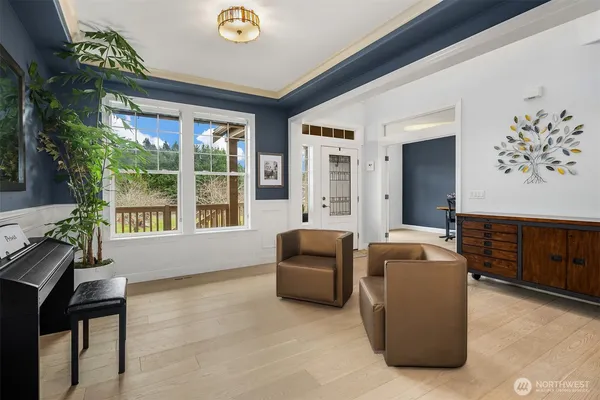 a living room with furniture and windows