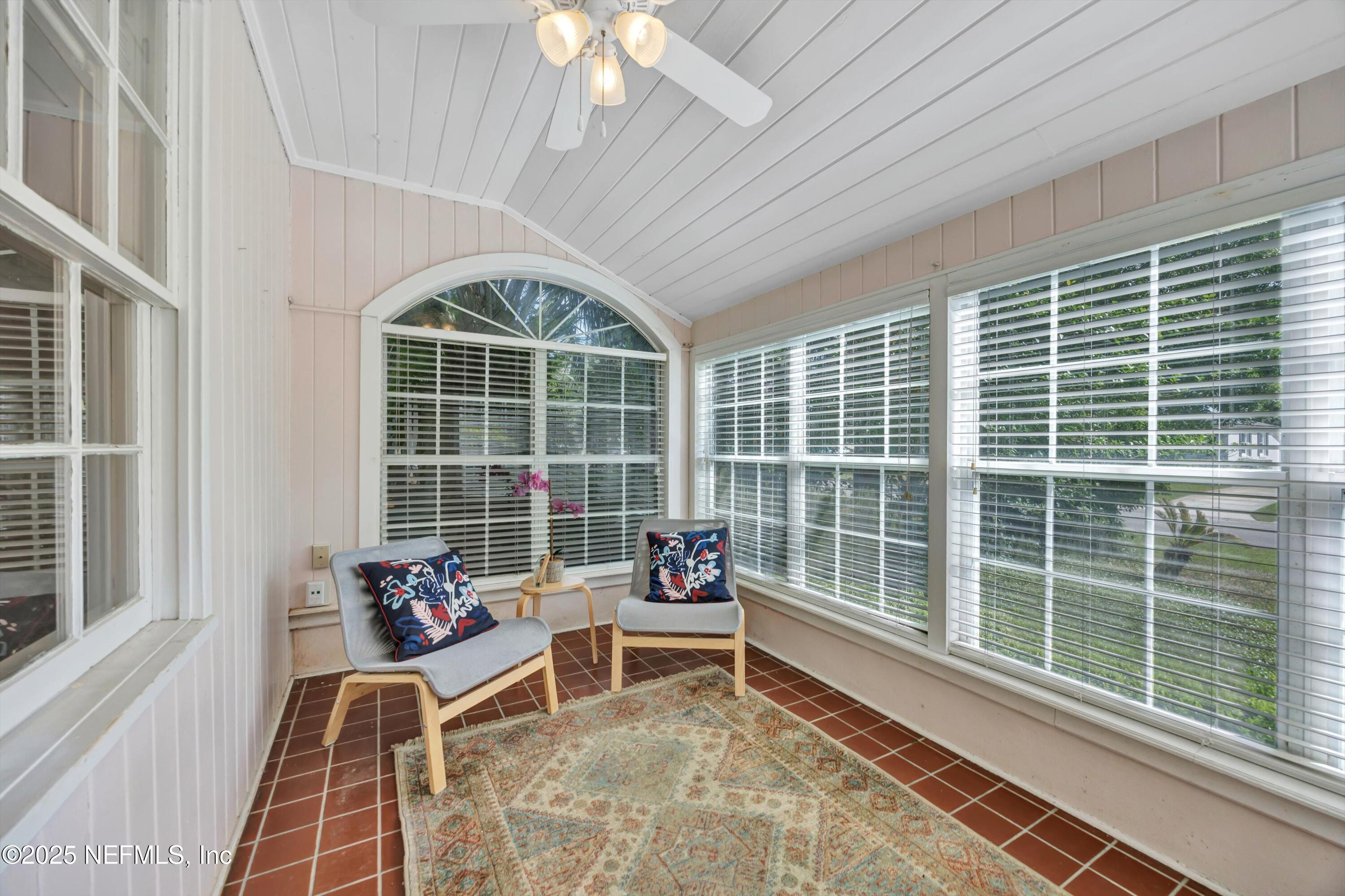 1425 Pinetree Road Jacksonville, FL 32207 - Photo 9 of 39 a living room with furniture and a window