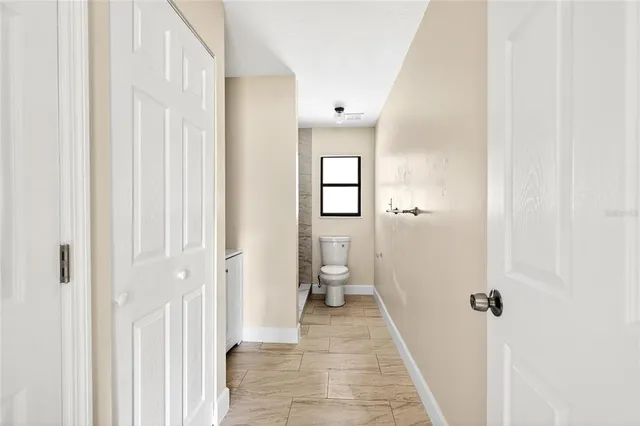 a view of a bathroom with a toilet