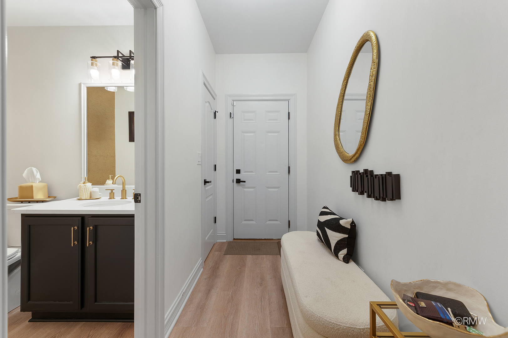 2459 Nicola Court Addison, IL 60101 - Photo 15 of 35 a bathroom with a sink and mirror