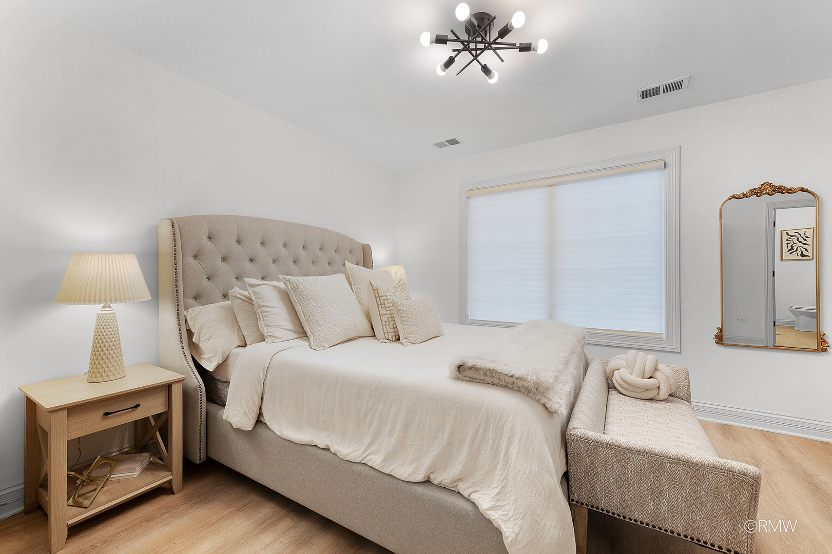 2459 Nicola Court Addison, IL 60101 - Photo 32 of 35 a bedroom with a bed and a lamp