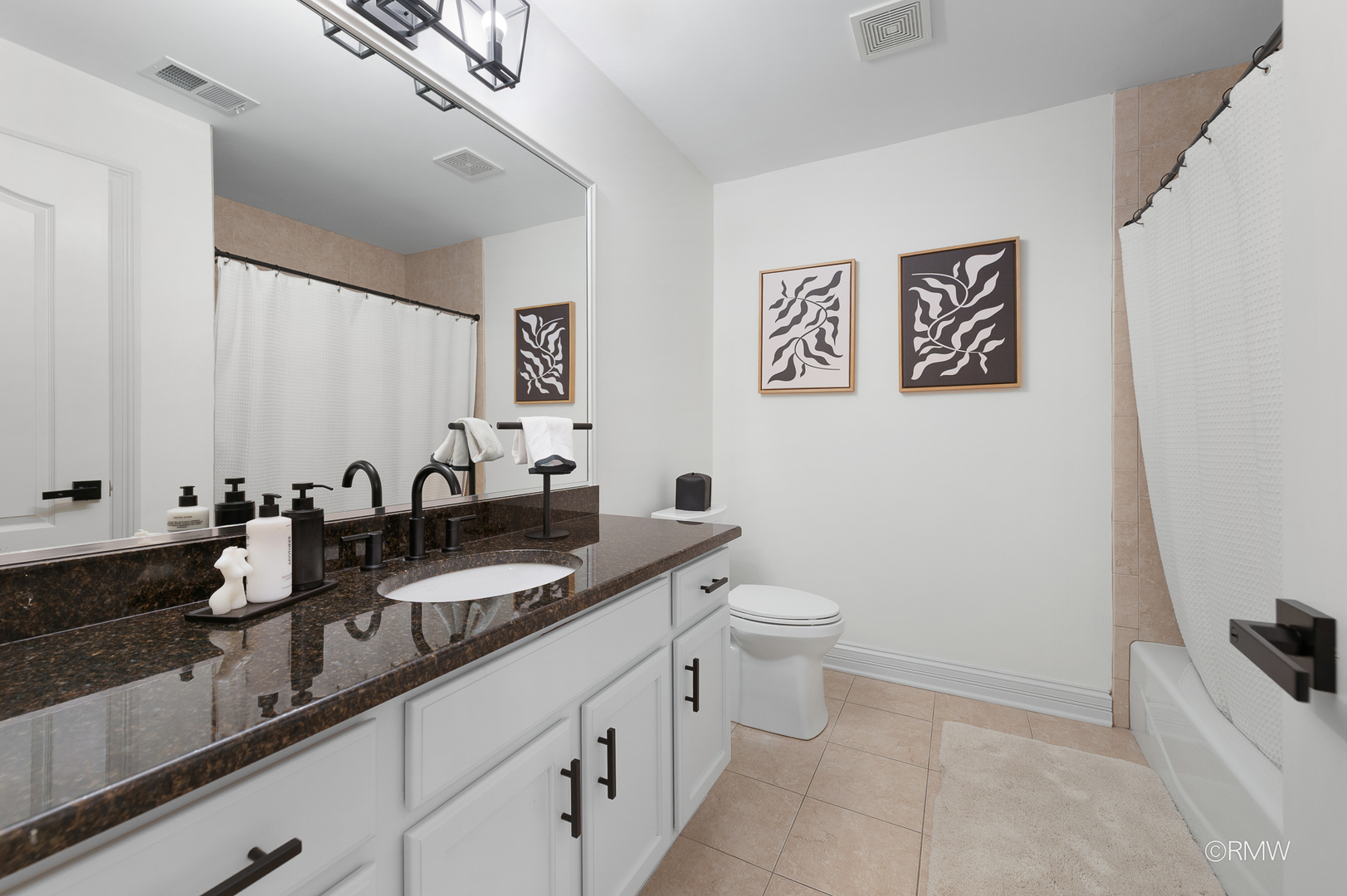2459 Nicola Court Addison, IL 60101 - Photo 35 of 35 a bathroom with a granite countertop sink mirror and toilet