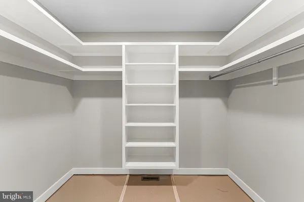 a view of a room with rack on the wall