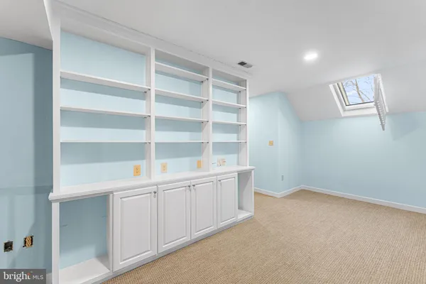 a view of an empty room with empty racks