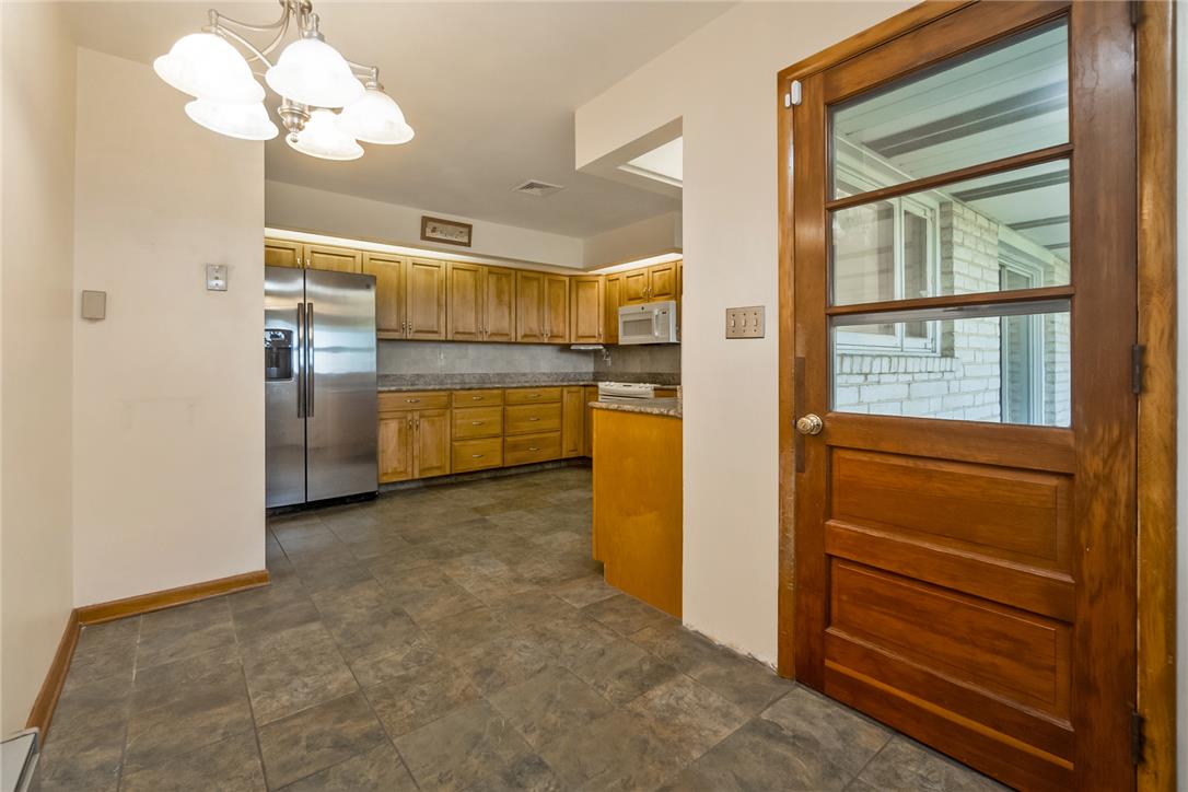 1657 Clearview Road Coplay, PA 18037 - Photo 44 of 77 A classic kitchen with durable tile flooring and warm wood cabinetry awaits your culinary touch.