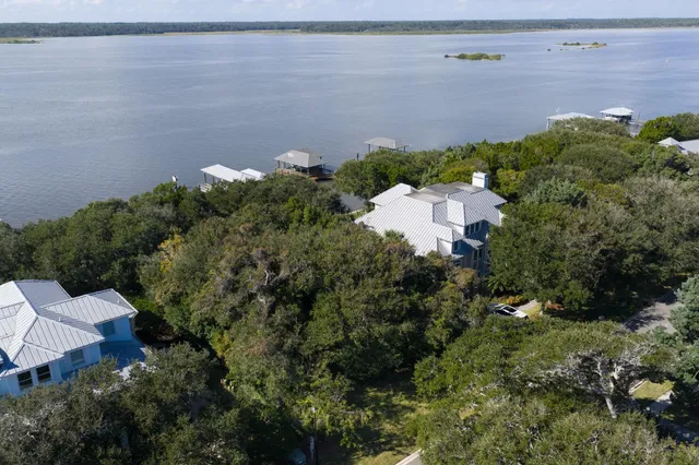 a view of swimming pool with outdoor seating and city view