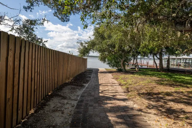 an aerial view of a house with outdoor space