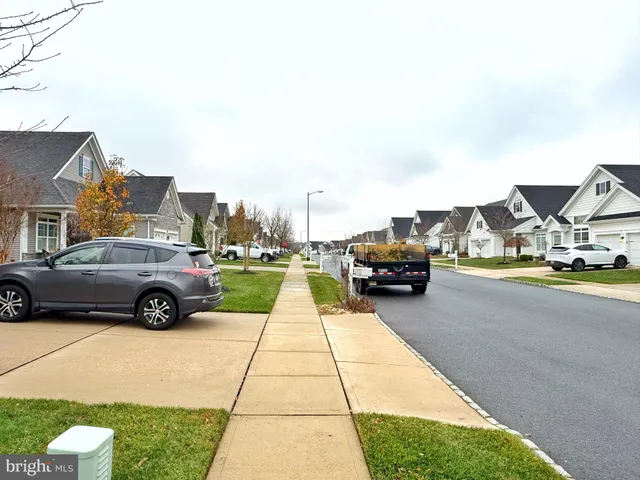 a kitchen with granite countertop stainless steel appliances and wooden cabinets