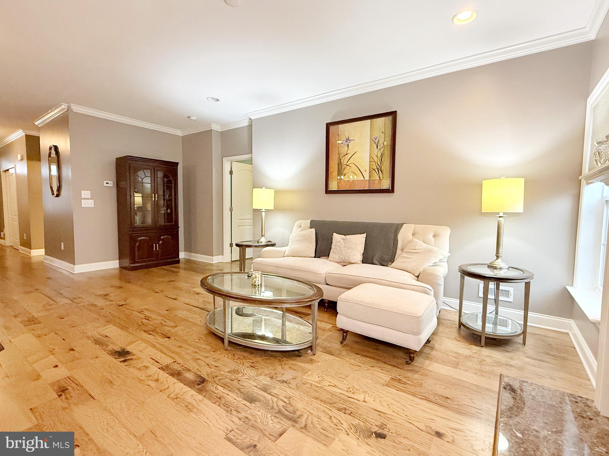 140 Weatherby Lane Glassboro, NJ 08028 - Photo 37 of 85 a spacious bedroom with a bed and lamp