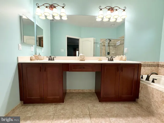 a bathroom with a sink toilet and vanity