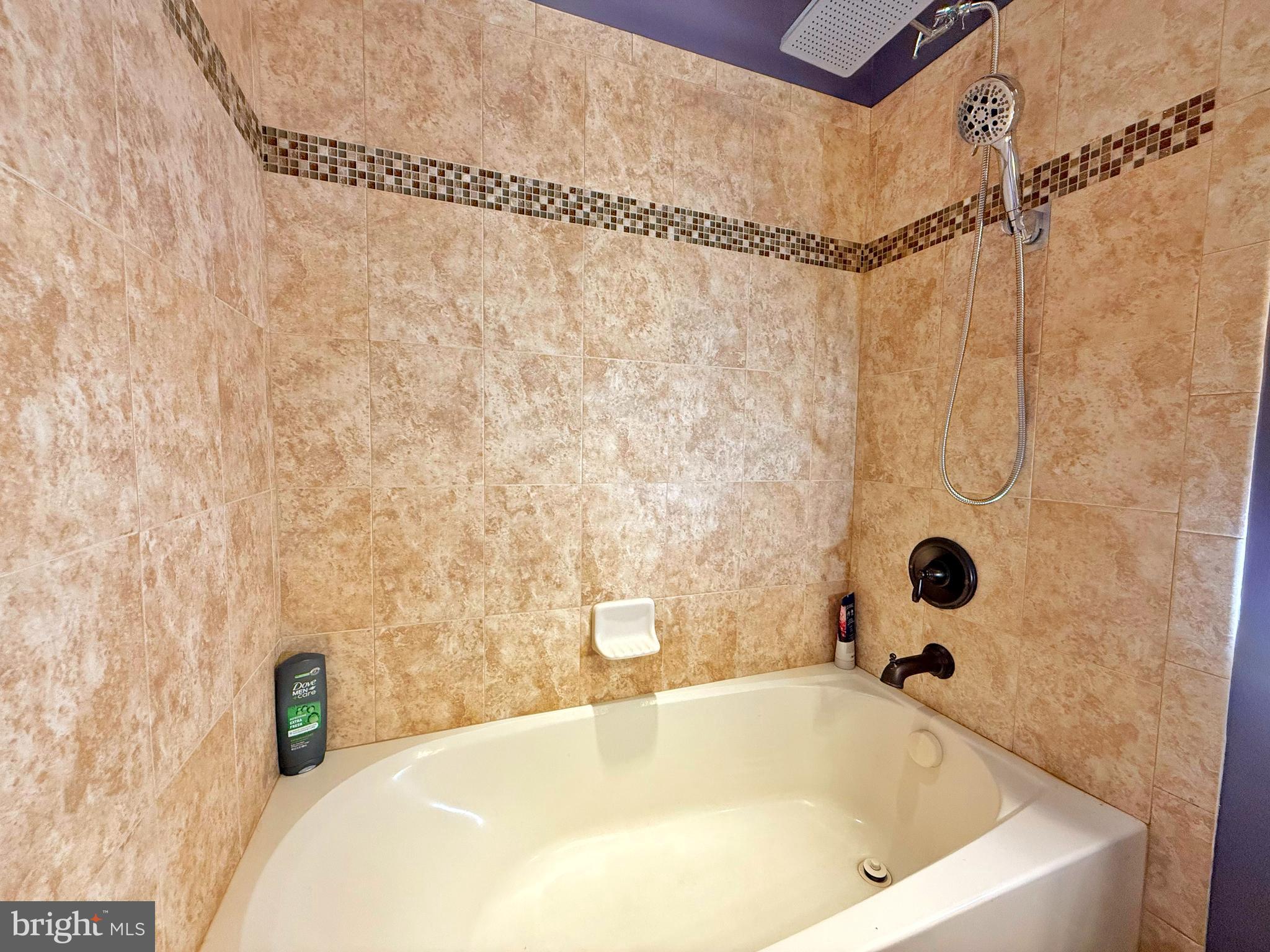 140 Weatherby Lane Glassboro, NJ 08028 - Photo 74 of 85 a bathroom with a tub and a shower