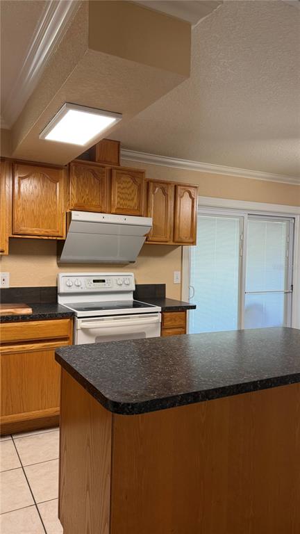 655 Murphy Road Winter Springs, FL 32708 - Photo 11 of 20 a kitchen with granite countertop a stove and a sink