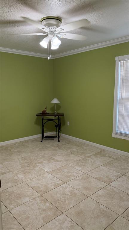 655 Murphy Road Winter Springs, FL 32708 - Photo 15 of 20 a bedroom with a bed and a chandelier