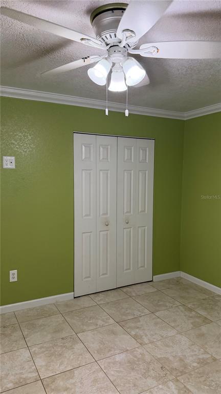 655 Murphy Road Winter Springs, FL 32708 - Photo 16 of 20 a view of a room with a fan and chandelier fan